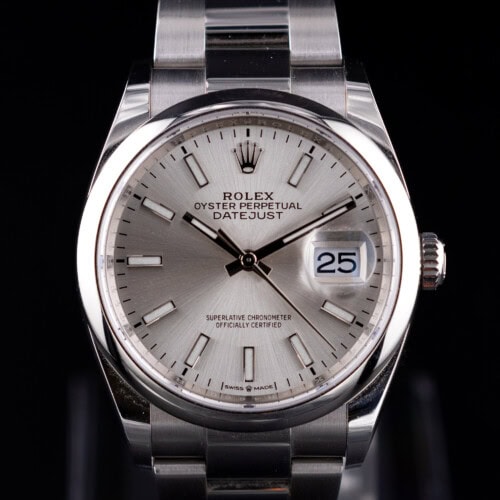 Rolex Datejust 126200 silver dial stainless steel watch with smooth bezel and Oyster bracelet