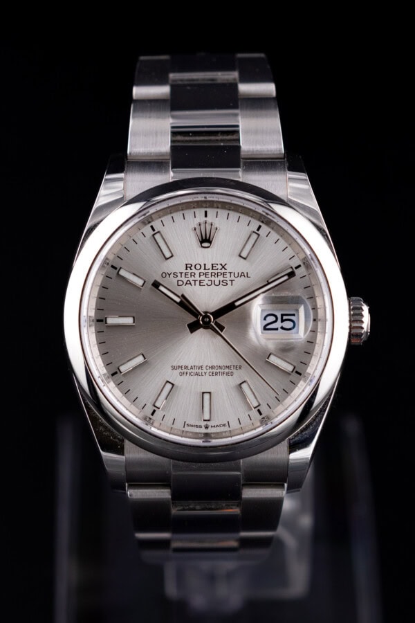 Rolex Datejust 126200 silver dial stainless steel watch with smooth bezel and Oyster bracelet