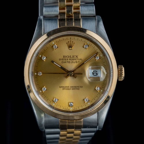 1994 Rolex Datejust 16203 two-tone steel and gold with champagne stick dial and smooth gold bezel
