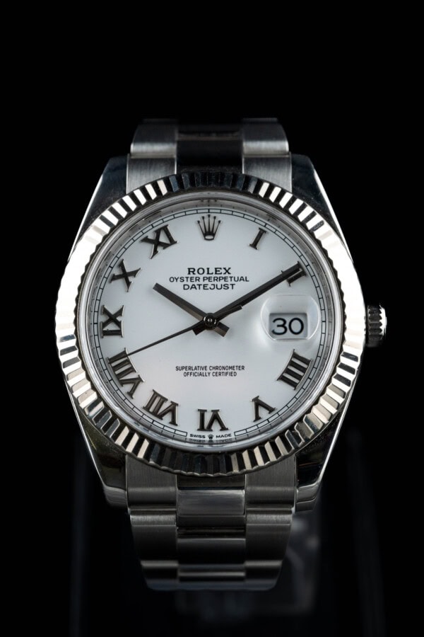 Rolex Datejust 41 ref 126334 in steel with white Roman dial and white gold fluted bezel on Oyster bracelet